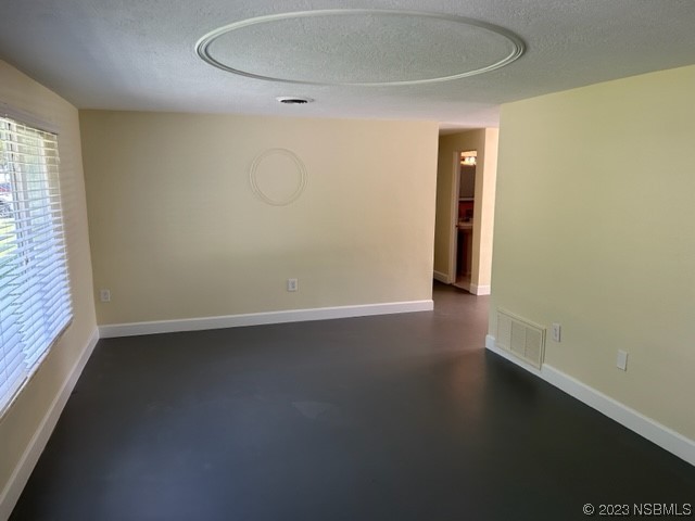 795 Biro Drive Port Orange, FL 32129 - Photo 13 of 26 an empty room with a door