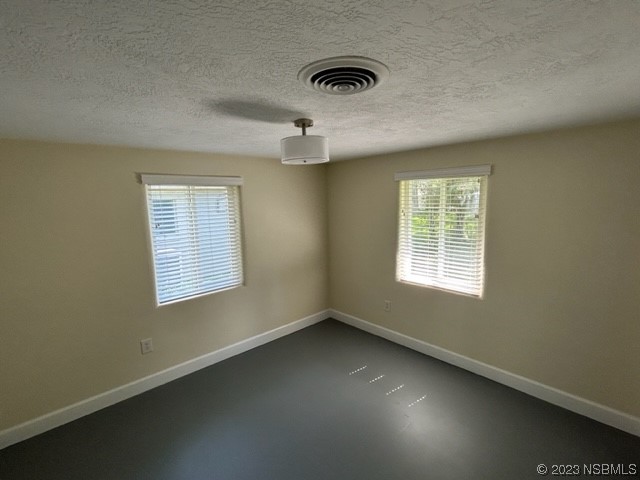 795 Biro Drive Port Orange, FL 32129 - Photo 16 of 26 an empty room with a window