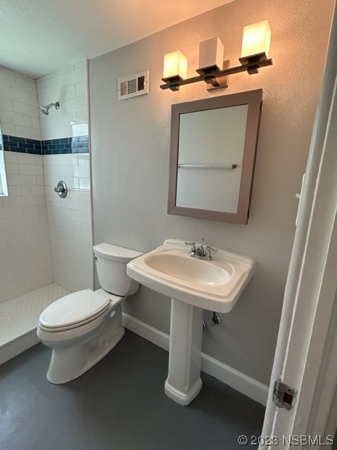 795 Biro Drive Port Orange, FL 32129 - Photo 19 of 26 a bathroom with a sink toilet and mirror
