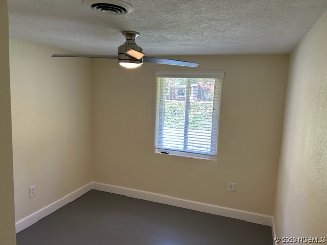 795 Biro Drive Port Orange, FL 32129 - Photo 21 of 26 an empty room with a window