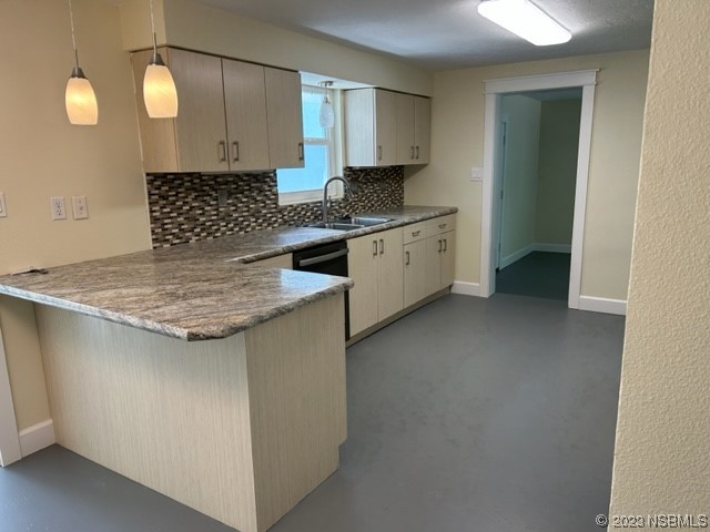 795 Biro Drive Port Orange, FL 32129 - Photo 7 of 26 a kitchen with a sink stove and cabinets