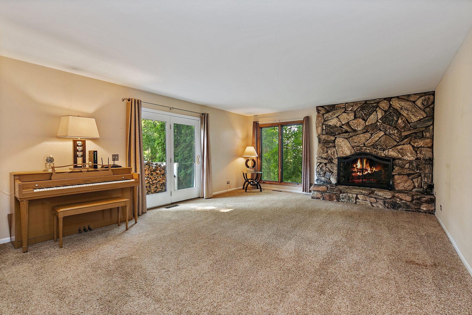 5305 North Ridgeway Road Ringwood, IL 60072 - Photo 15 of 27 a living room with furniture and a fireplace