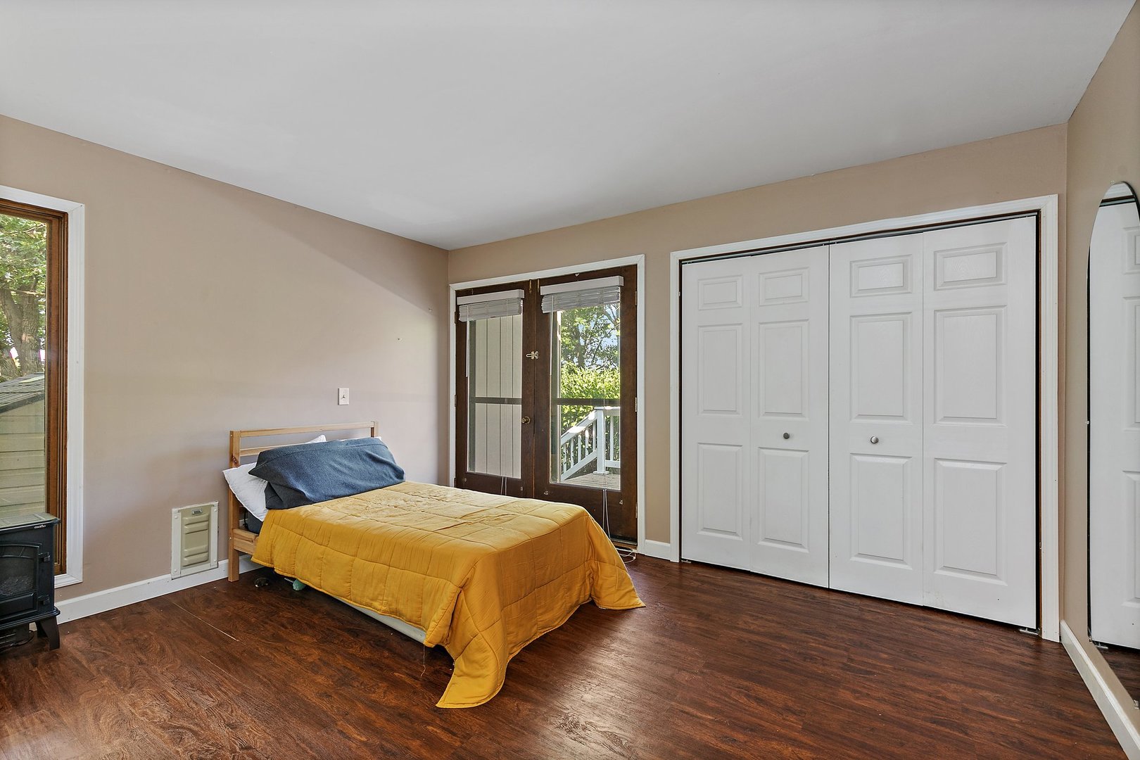 5305 North Ridgeway Road Ringwood, IL 60072 - Photo 20 of 27 a bedroom with a bed and wooden floor