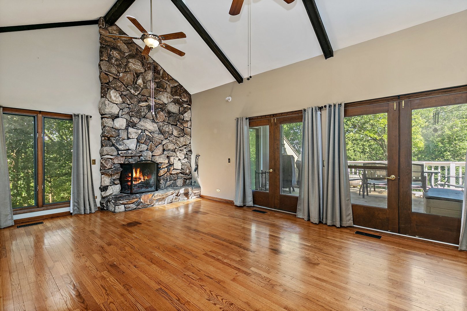 5305 North Ridgeway Road Ringwood, IL 60072 - Photo 7 of 27 a view of a livingroom with wooden floor and a fireplace