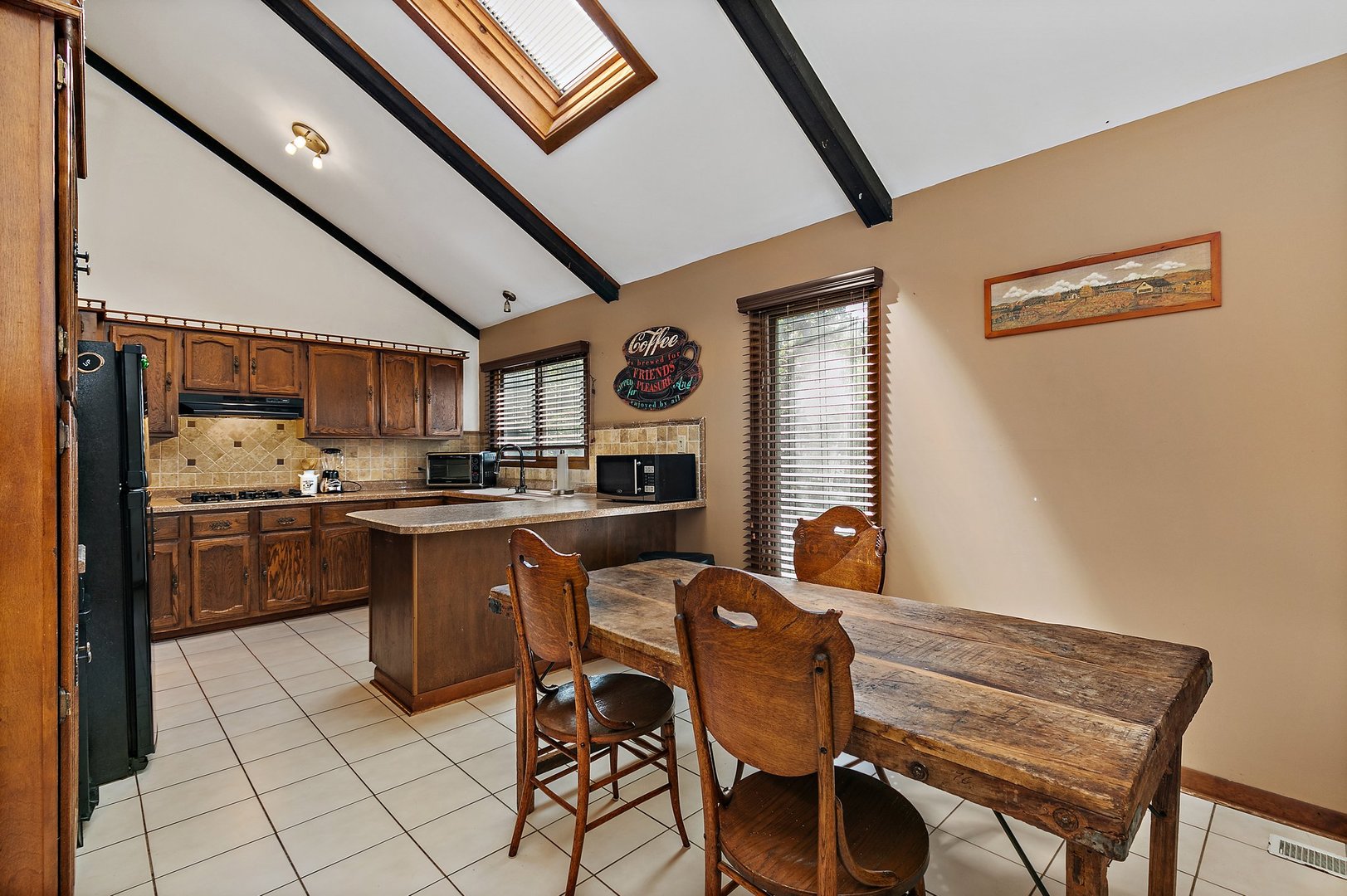 5305 North Ridgeway Road Ringwood, IL 60072 - Photo 8 of 27 a kitchen with a sink cabinets and window