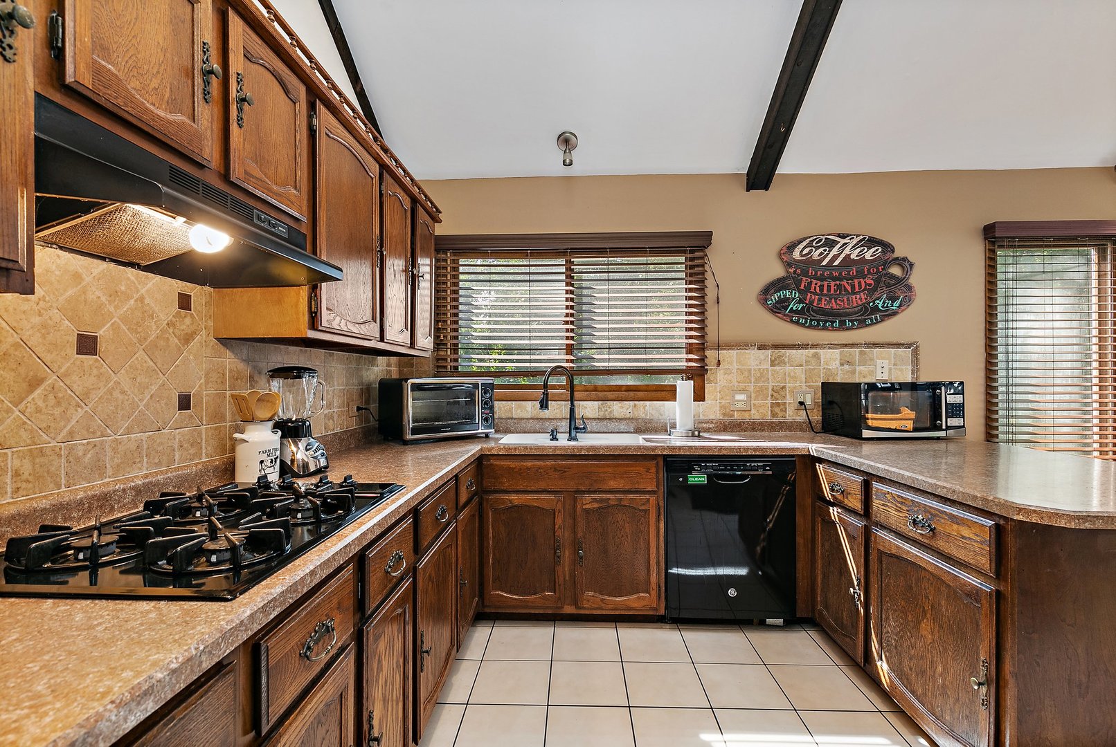 5305 North Ridgeway Road Ringwood, IL 60072 - Photo 10 of 27 a kitchen with stainless steel appliances a sink stove and cabinets