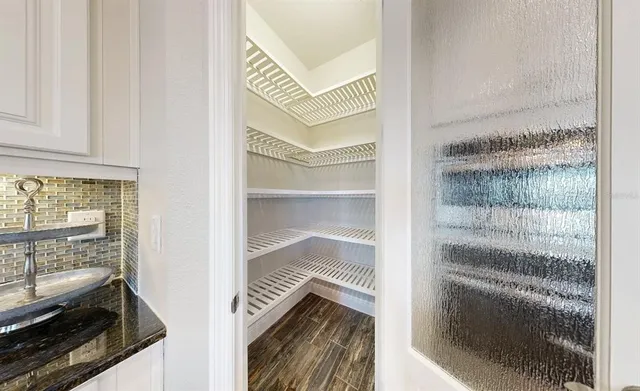 a view of entryway with wooden floor