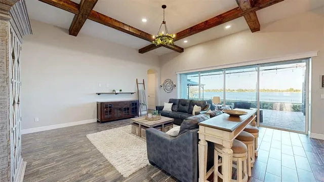 an aerial view of house with yard swimming pool and outdoor seating