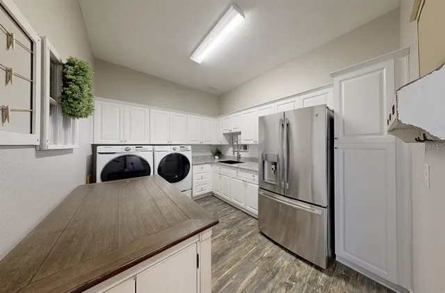 an aerial view of a house with a lake view