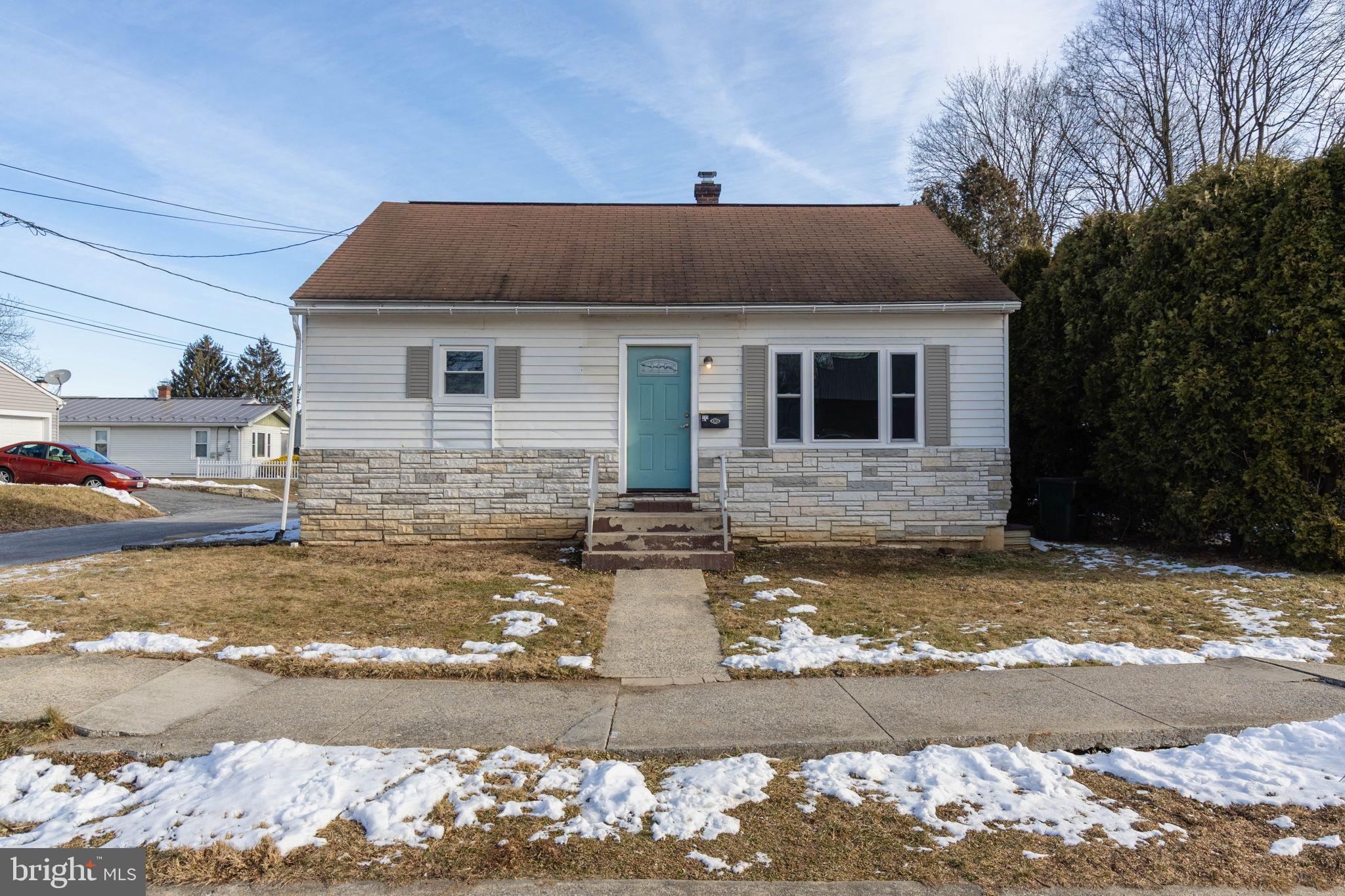 Charming home with inviting curb appeal.
