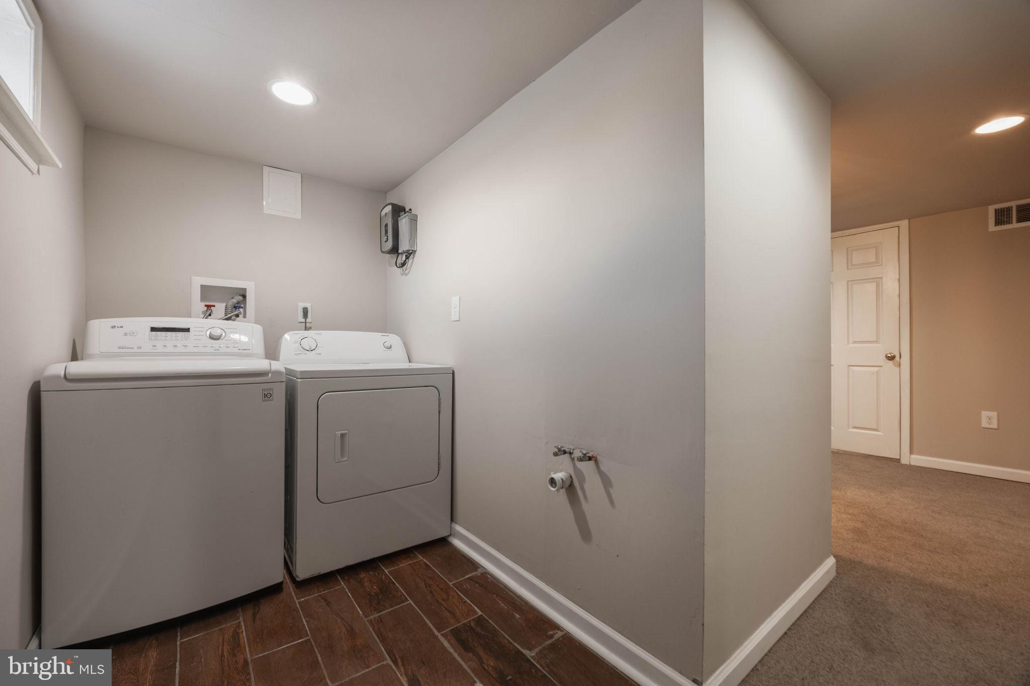 155 North Hazel Street Manheim, PA 17545 - Photo 21 of 25 Modern laundry space with sleek appliances.