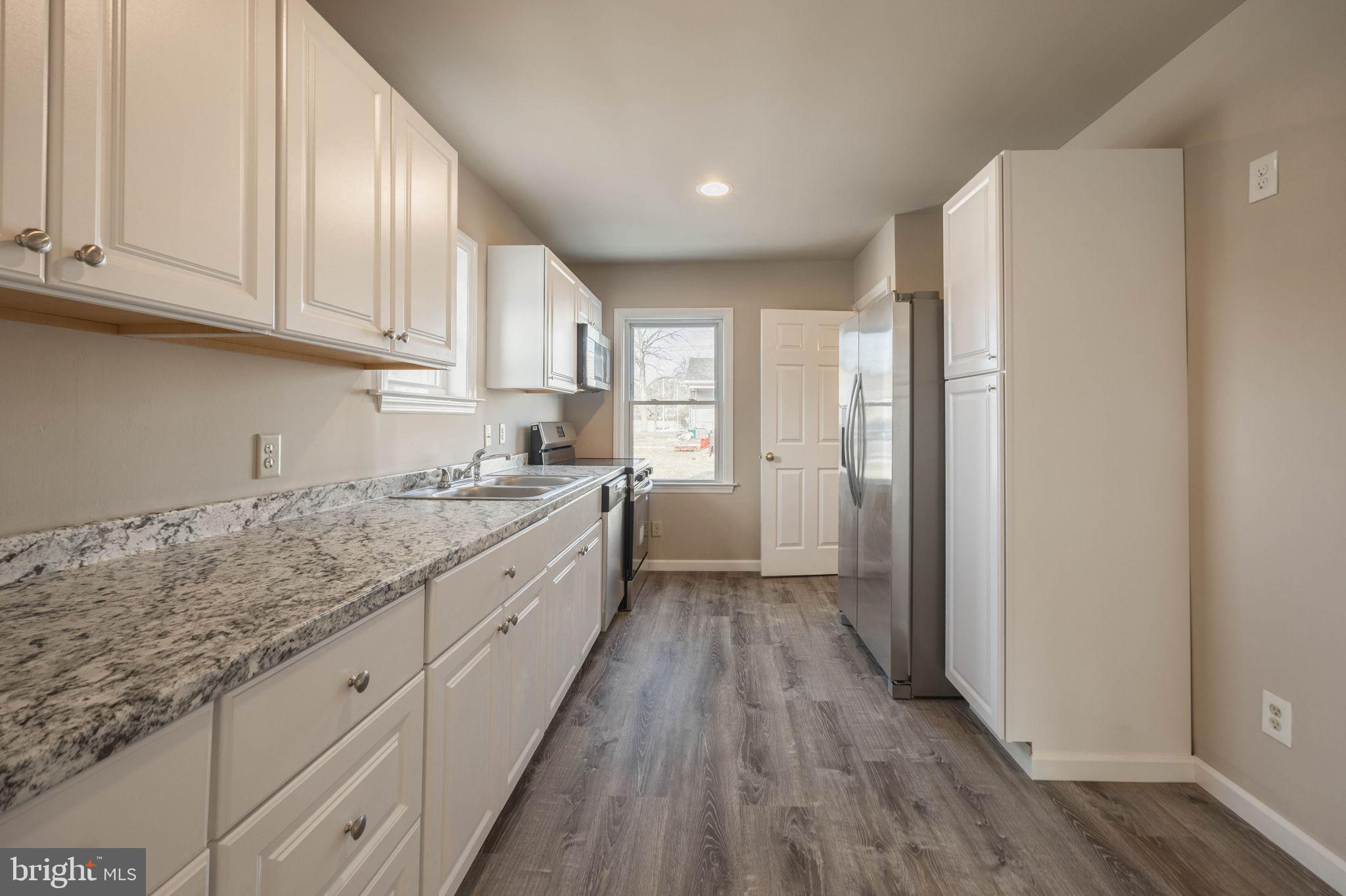 155 North Hazel Street Manheim, PA 17545 - Photo 6 of 25 Modern kitchen with sleek finishes.