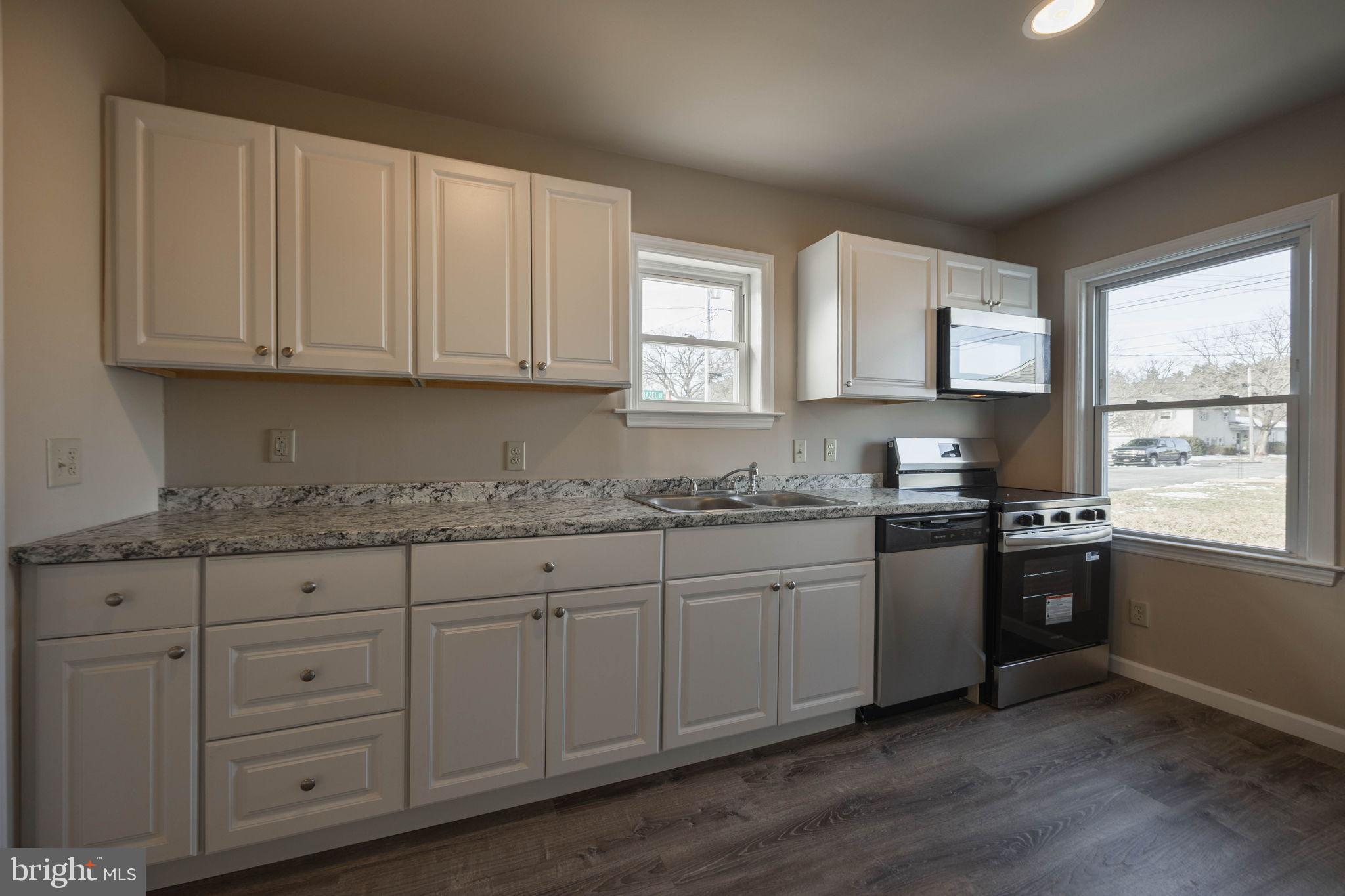 155 North Hazel Street Manheim, PA 17545 - Photo 8 of 25 Modern kitchen with sleek cabinetry.