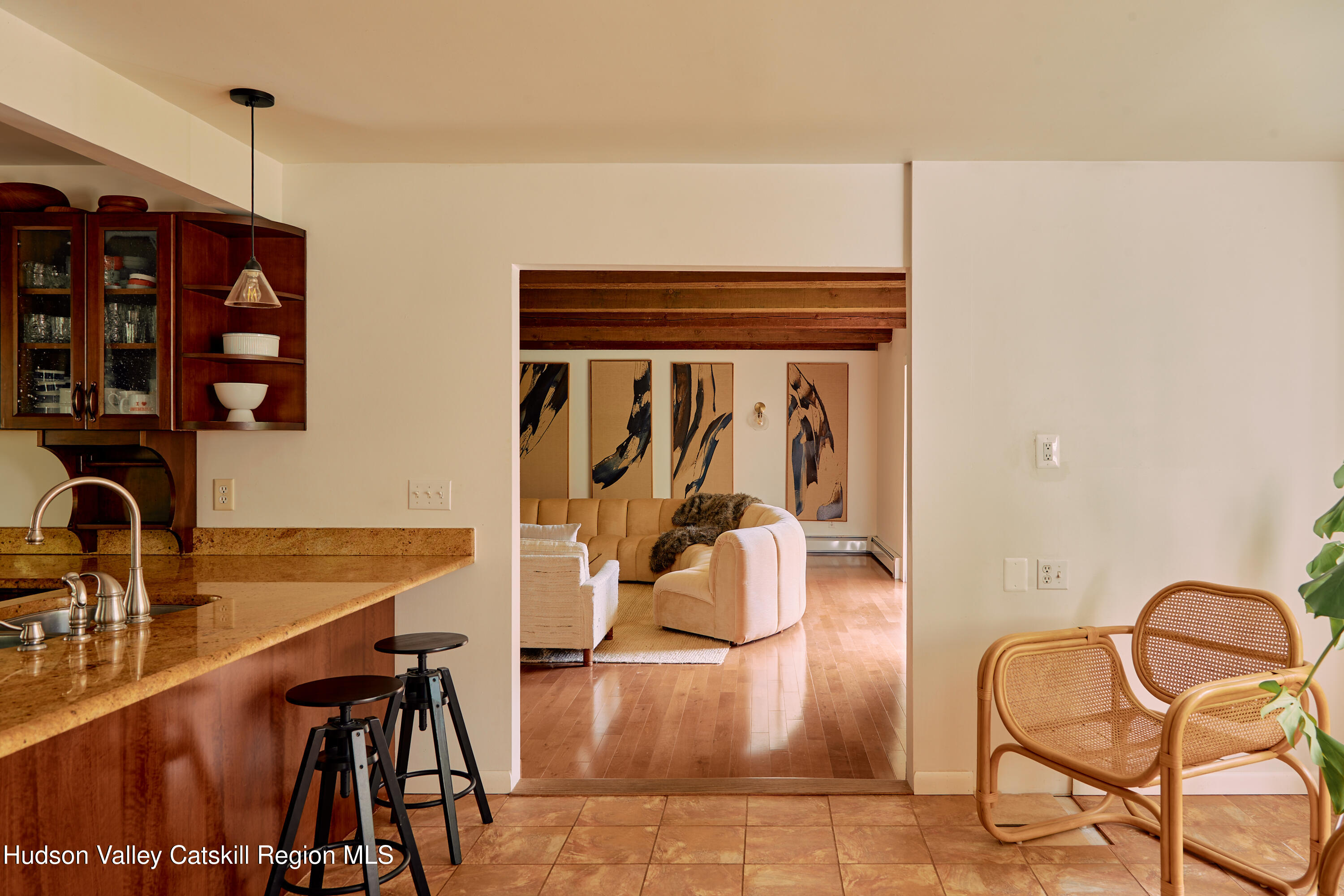 33 Race Track Road Bearsville, NY 12409 - Photo 19 of 37 a view of a kitchen with dining table and chairs