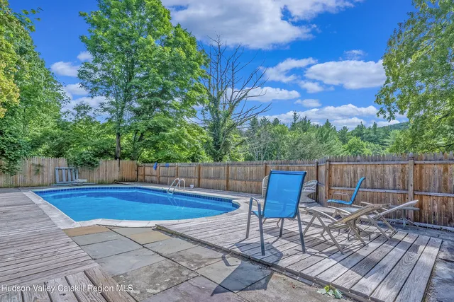 a living room with a couch and a rug