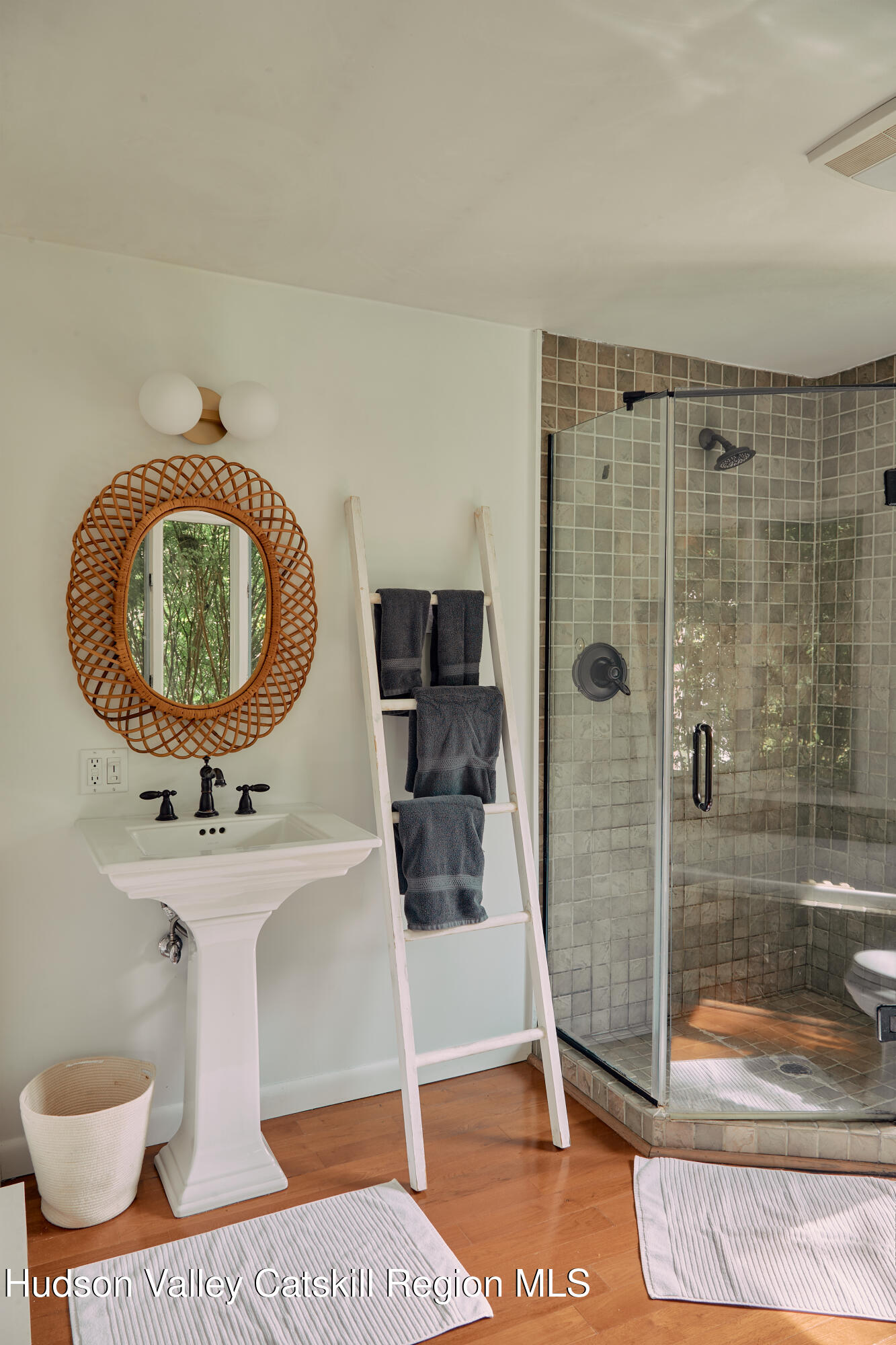 33 Race Track Road Bearsville, NY 12409 - Photo 26 of 37 a bathroom with a sink toilet a mirror and shower