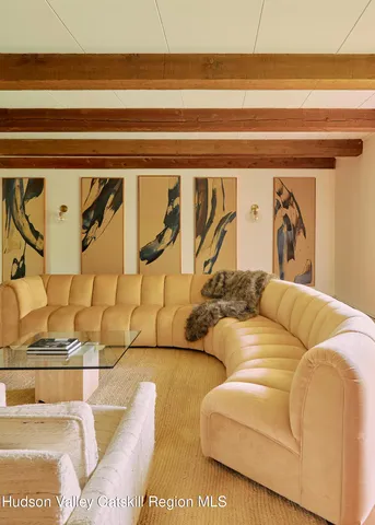 a view of a living room with furniture