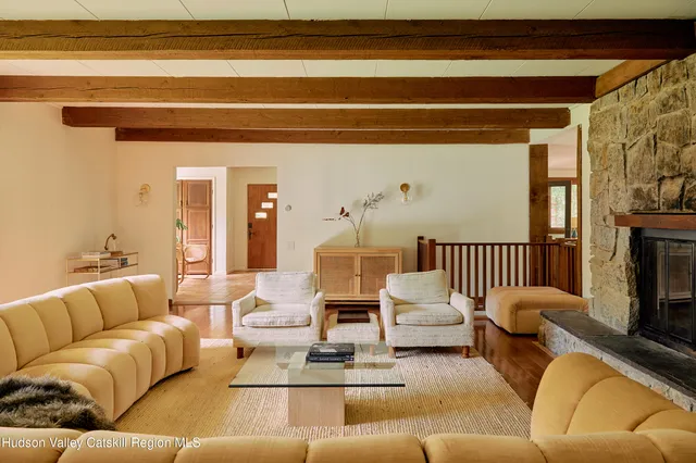 a living room with furniture and a couch