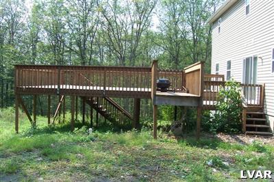 1408 Whitetail Road Henryville, PA 18332 - Photo 3 of 3 a view of backyard with green space