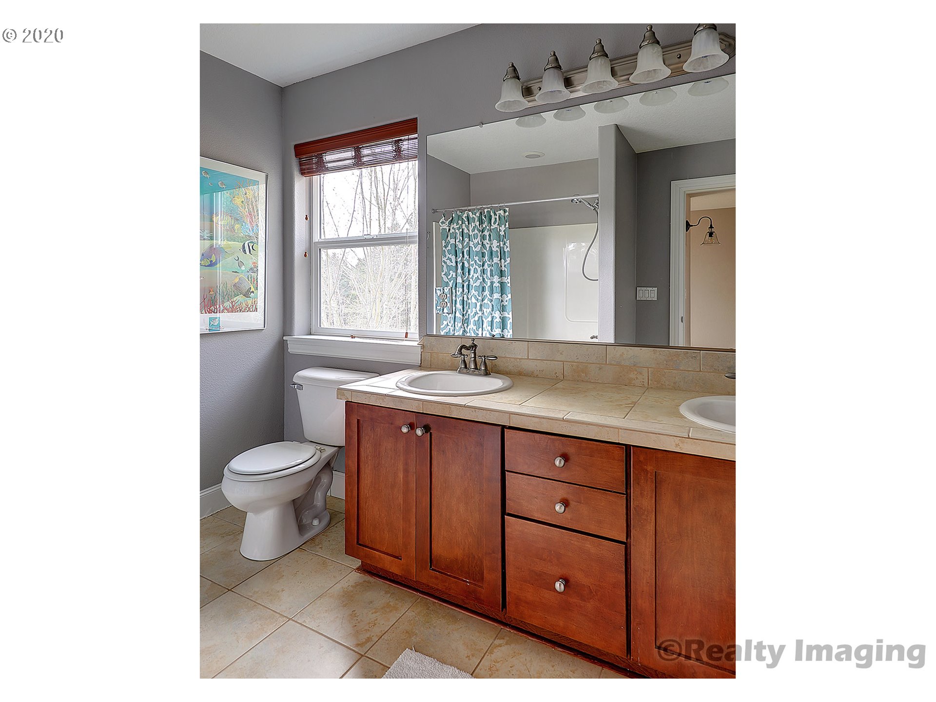592 Southwest Elderbrook Place Portland, OR 97225 - Photo 23 of 30 a bathroom with a sink mirror and a toilet