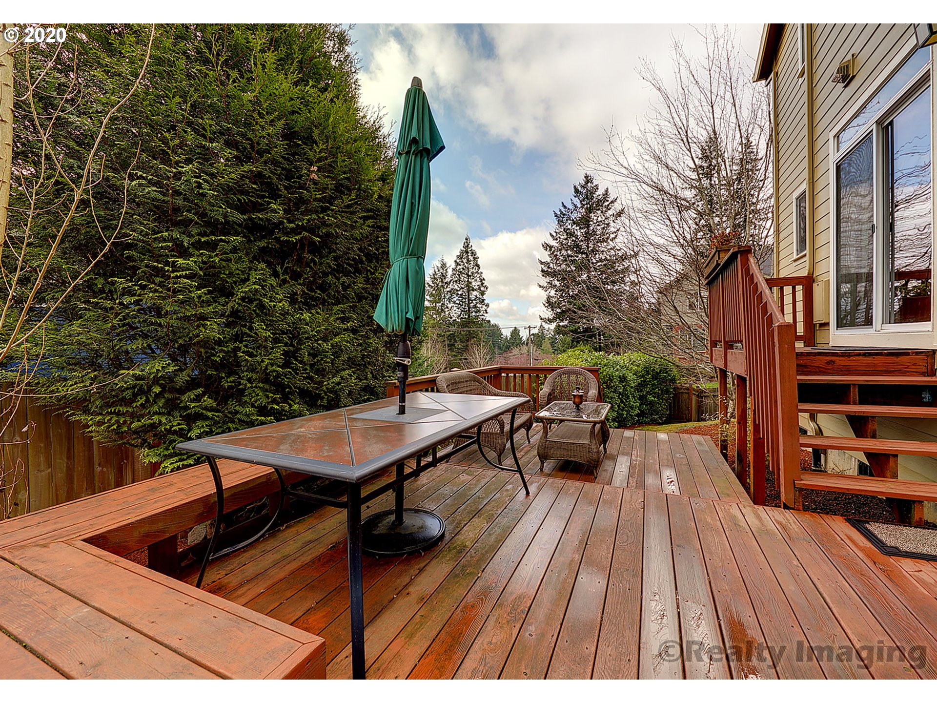 592 Southwest Elderbrook Place Portland, OR 97225 - Photo 26 of 30 a view of a chairs and table on the wooden floor