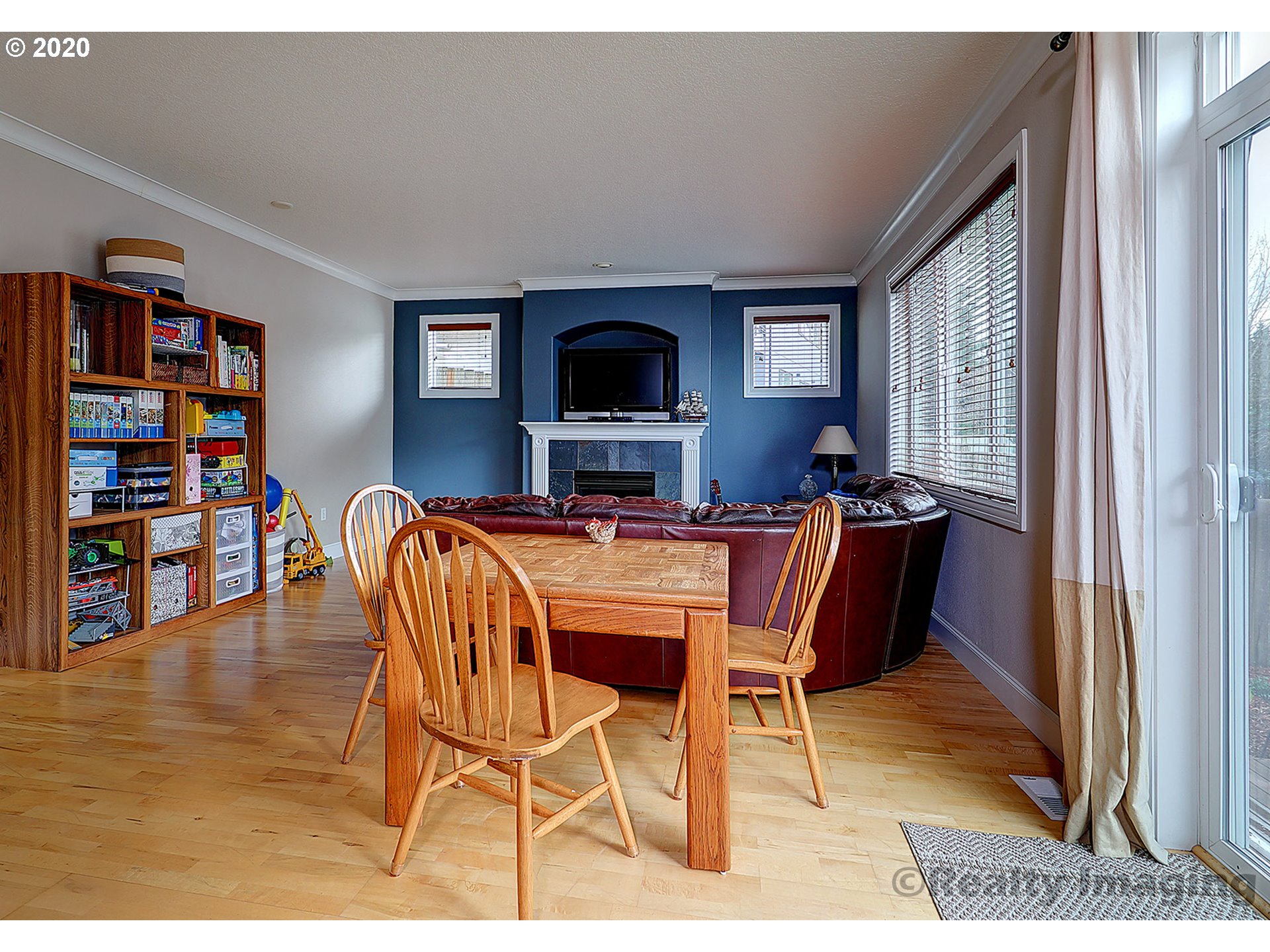 592 Southwest Elderbrook Place Portland, OR 97225 - Photo 9 of 30 a dining room with furniture and wooden floor