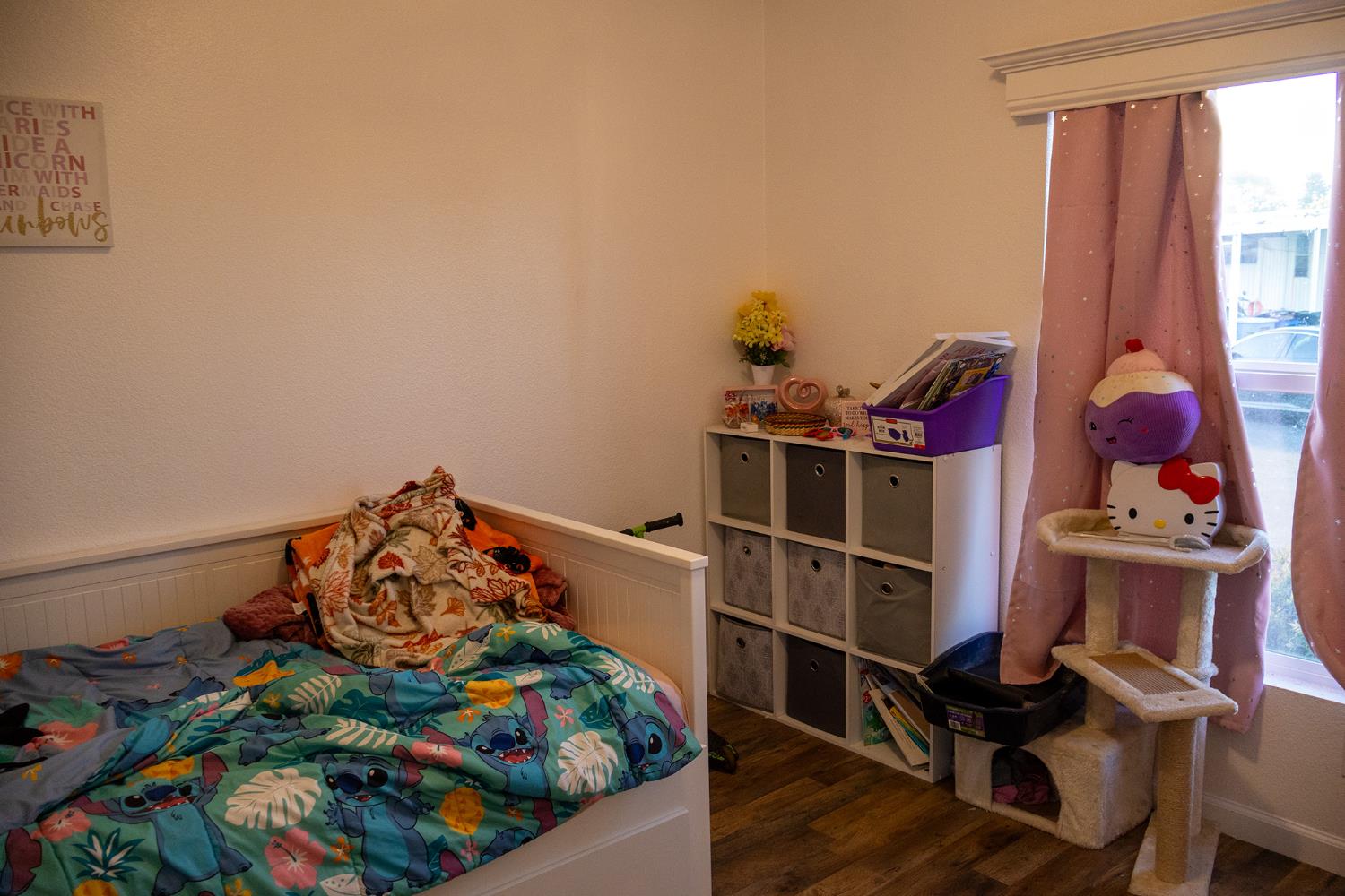 2499 East Gerard Avenue, Unit 123 Merced, CA 95341 - Photo 15 of 15 a room with toys and wooden floor