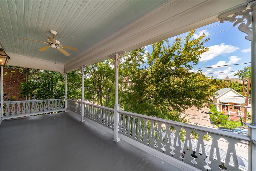 2315 Routh Street Dallas, TX 75201 - Photo 19 of 38 a view of a porch with wooden floor