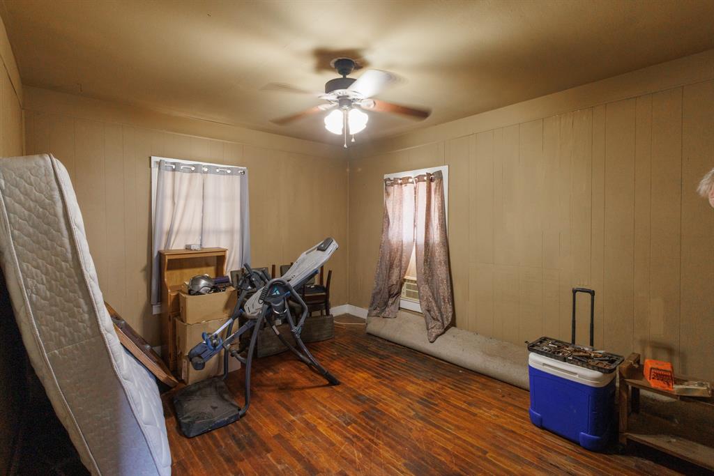 2202 Chester Street Sweetwater, TX 79556 - Photo 6 of 21 a view of a dining room with furniture and a chandelier