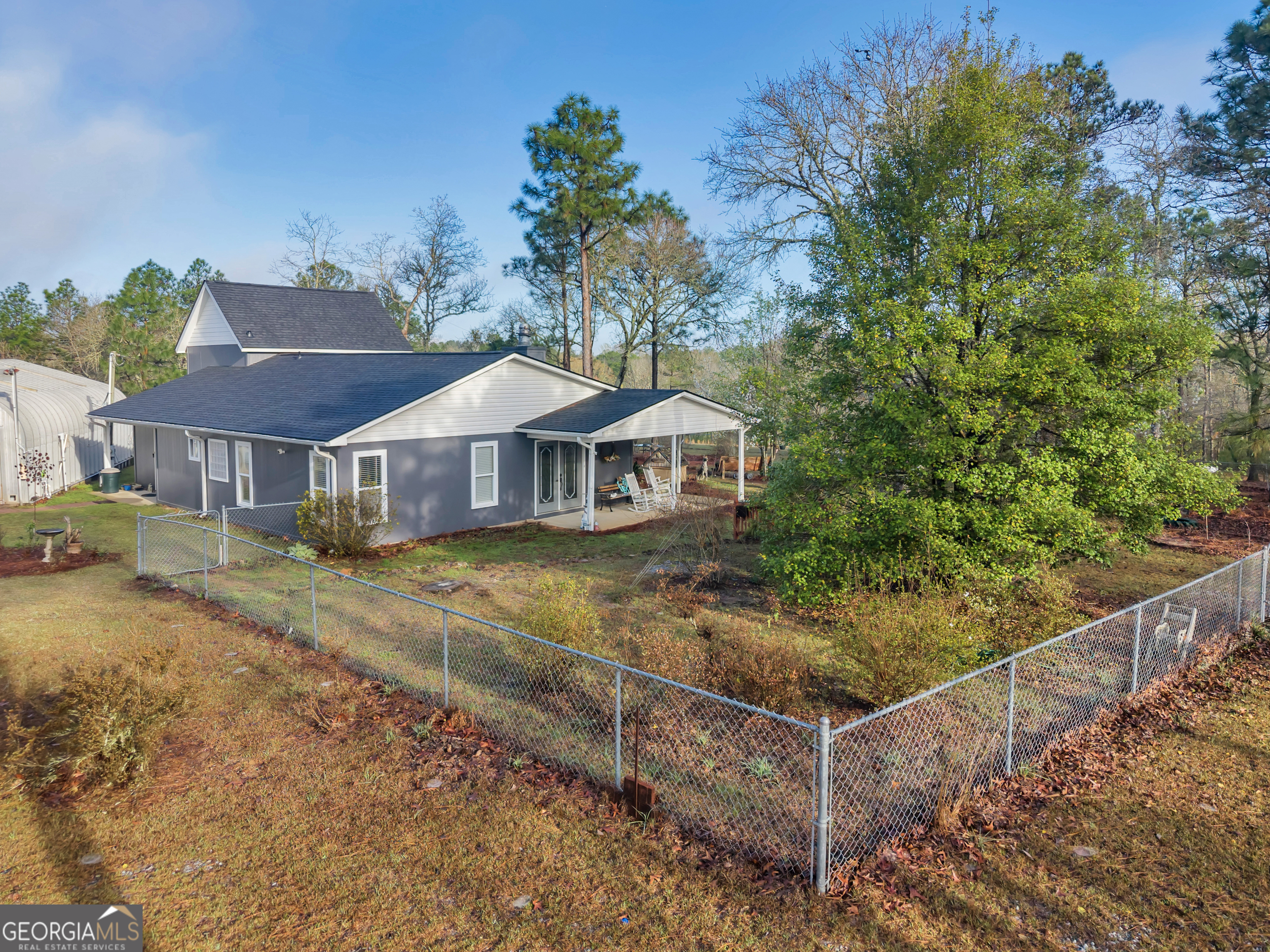 271 Dr Brooks Road Box Springs, GA 31801 - Photo 17 of 63 a front view of a house with a yard