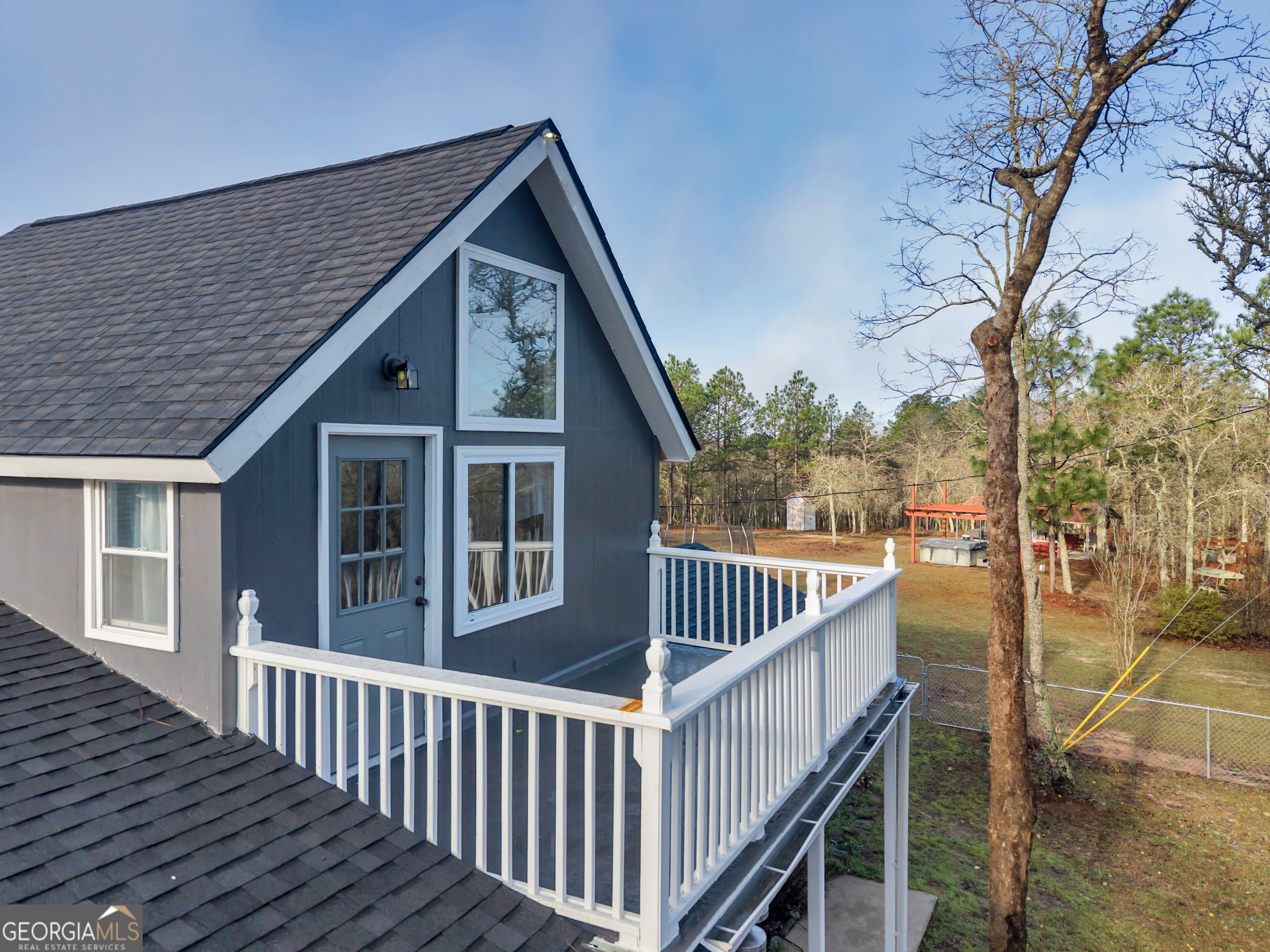 271 Dr Brooks Road Box Springs, GA 31801 - Photo 19 of 63 a view of a house with backyard and deck