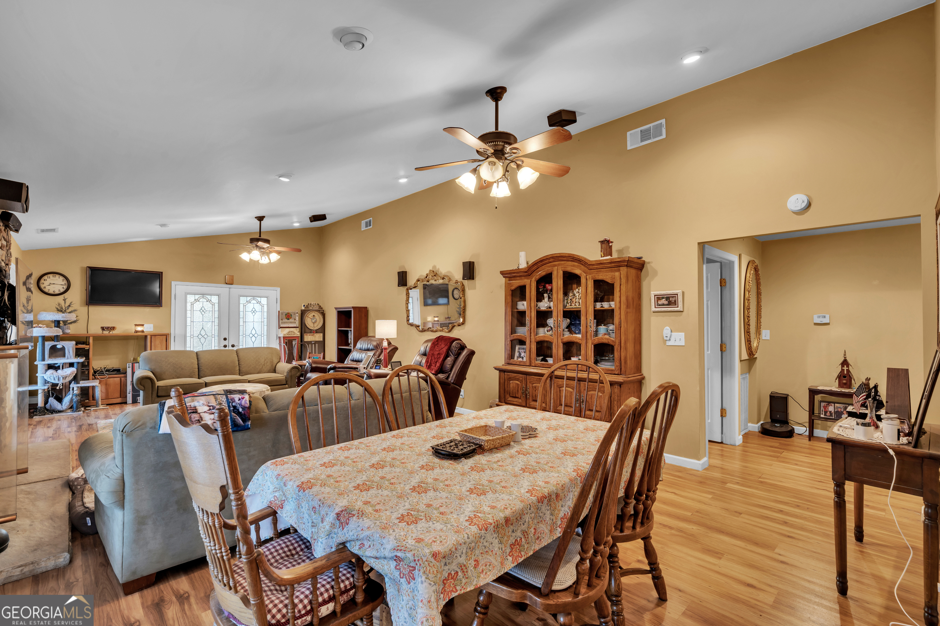 271 Dr Brooks Road Box Springs, GA 31801 - Photo 30 of 63 a view of a dining area with furniture and a chandelier