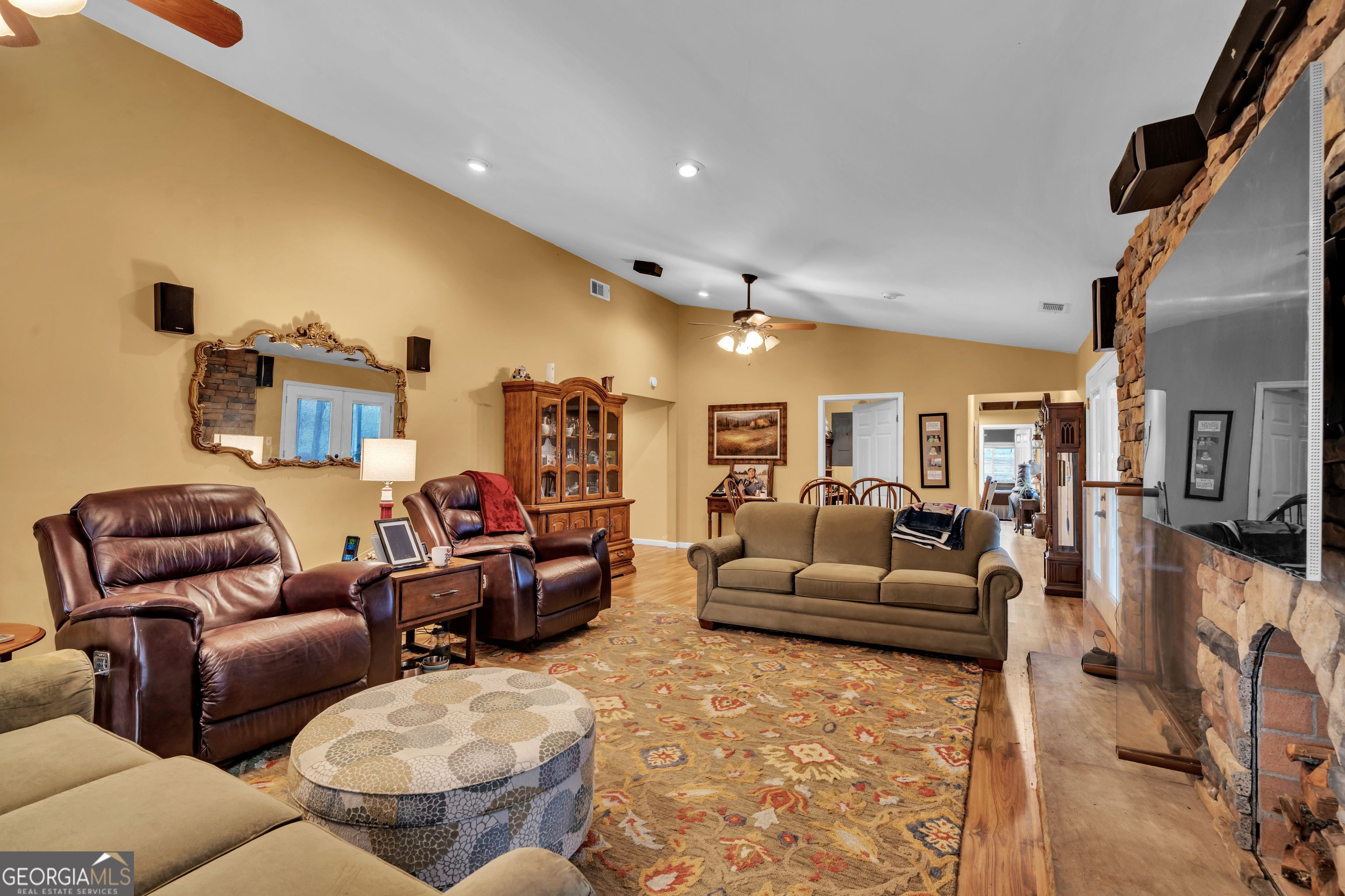 271 Dr Brooks Road Box Springs, GA 31801 - Photo 32 of 63 a living room with furniture and a flat screen tv