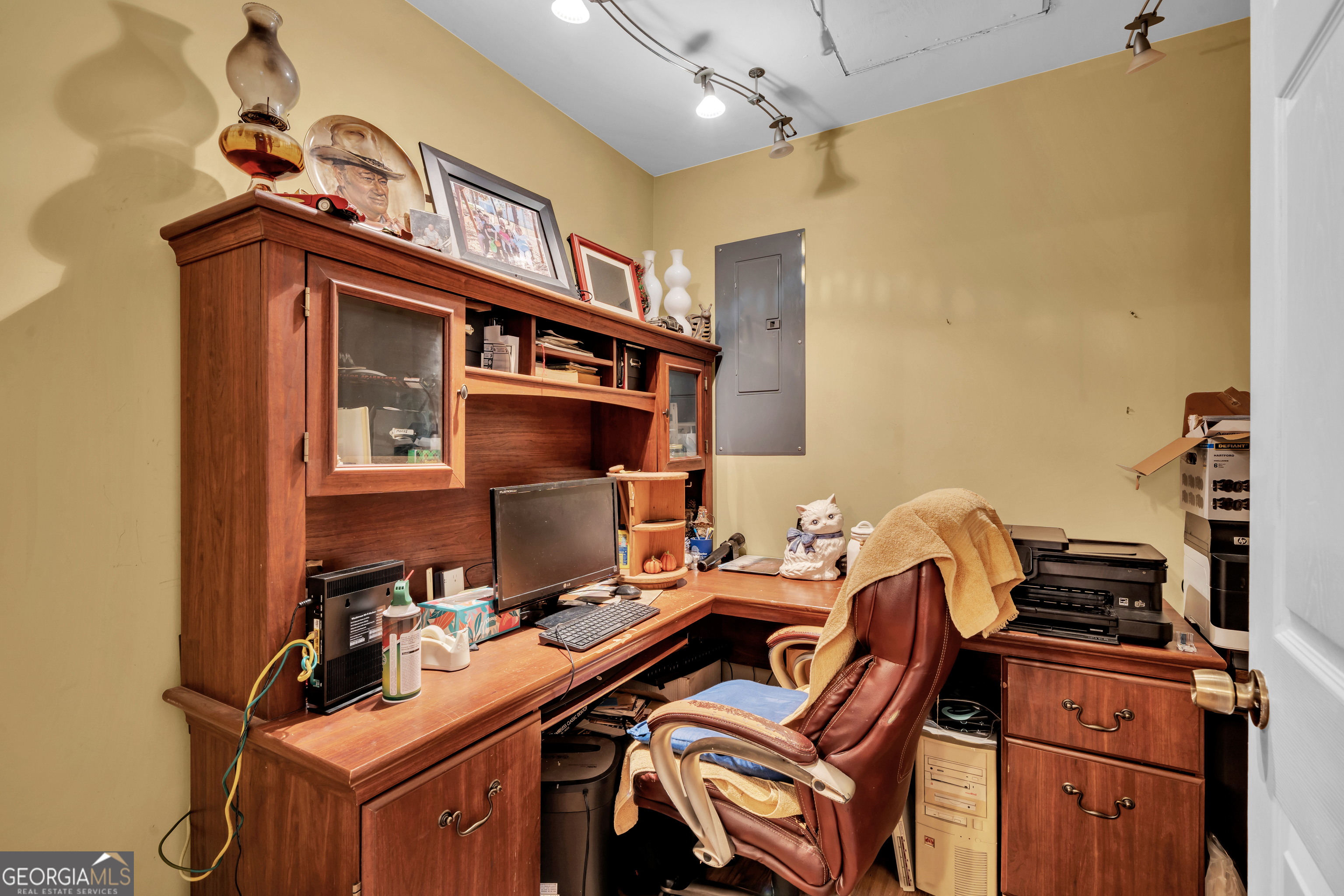 271 Dr Brooks Road Box Springs, GA 31801 - Photo 34 of 63 a view of a workspace with furniture
