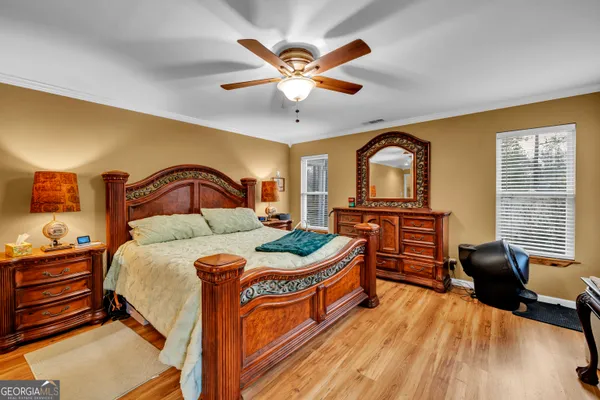 a lobby with furniture and potted plant