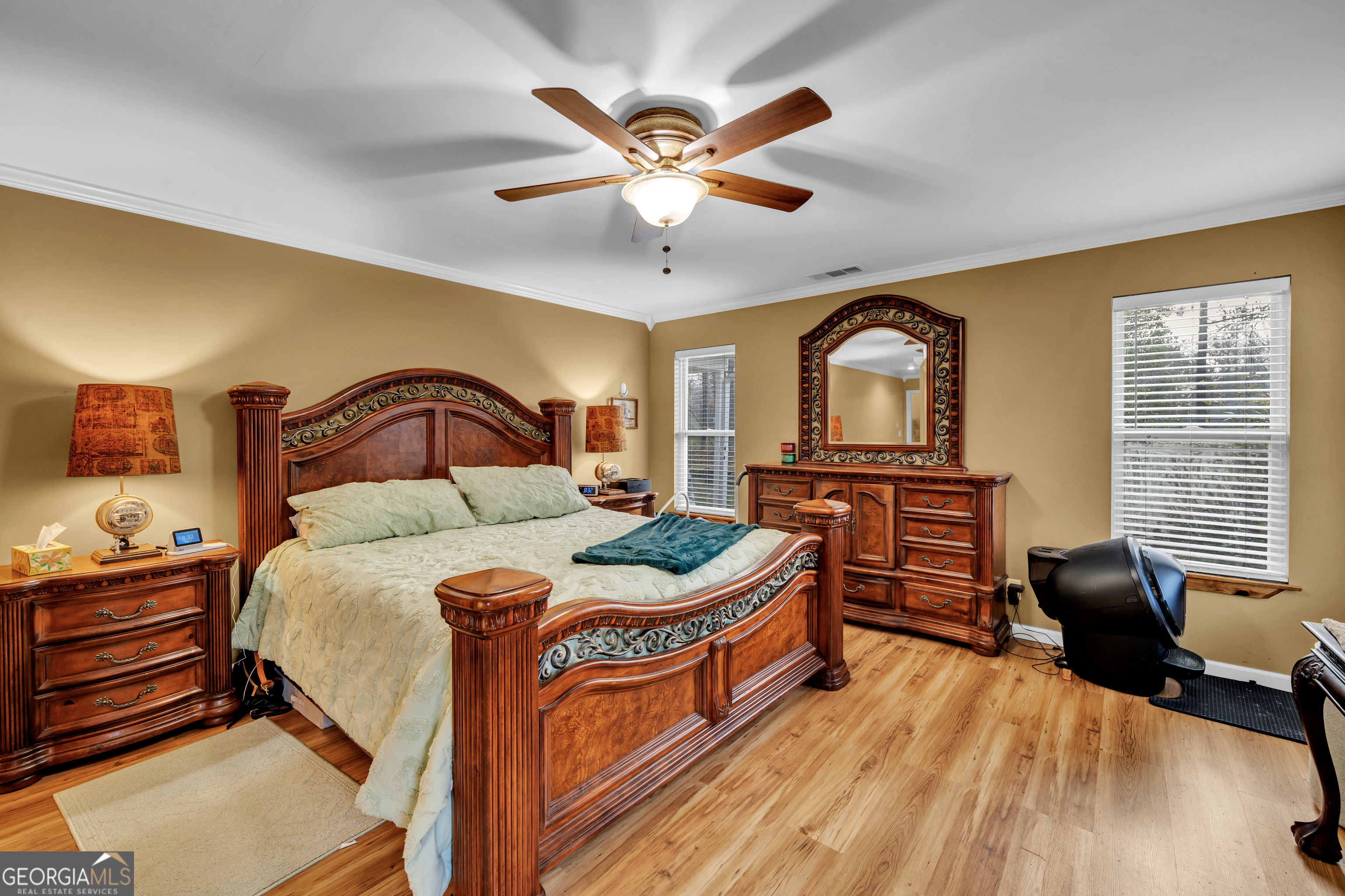 271 Dr Brooks Road Box Springs, GA 31801 - Photo 39 of 63 a bedroom with a bed next to a window and a flat screen tv