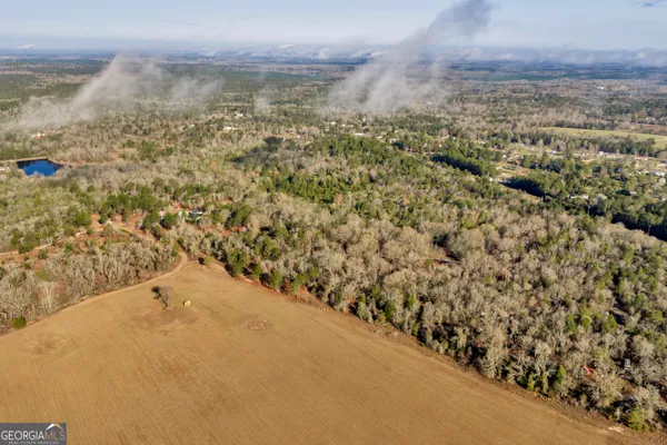 a view of a yard with an outdoor space