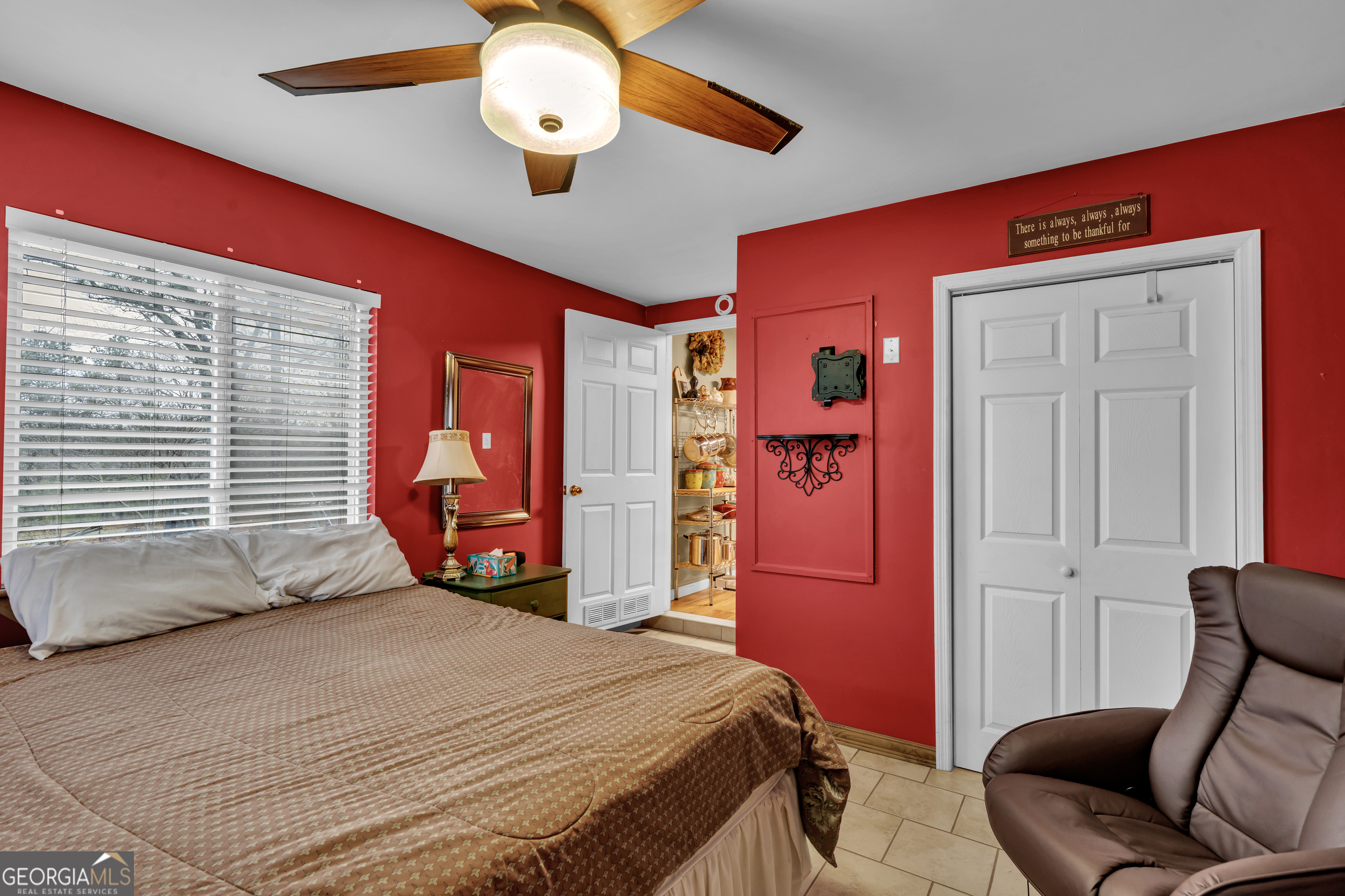 271 Dr Brooks Road Box Springs, GA 31801 - Photo 41 of 63 a bedroom with a bed and chair