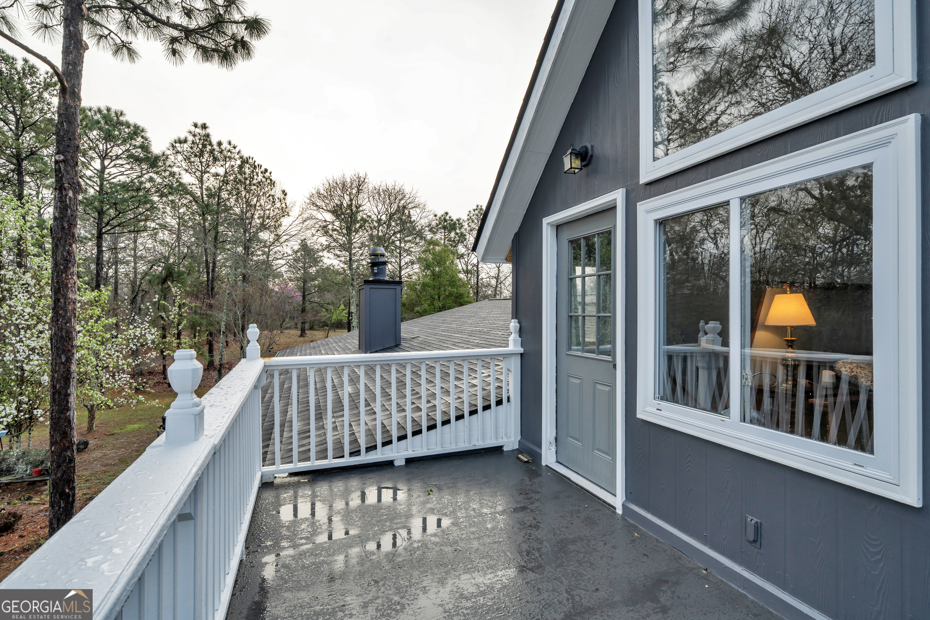 271 Dr Brooks Road Box Springs, GA 31801 - Photo 45 of 63 a view of a brick house with large windows and plants