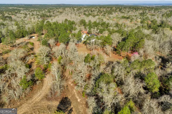 a view of a yard with an outdoor space