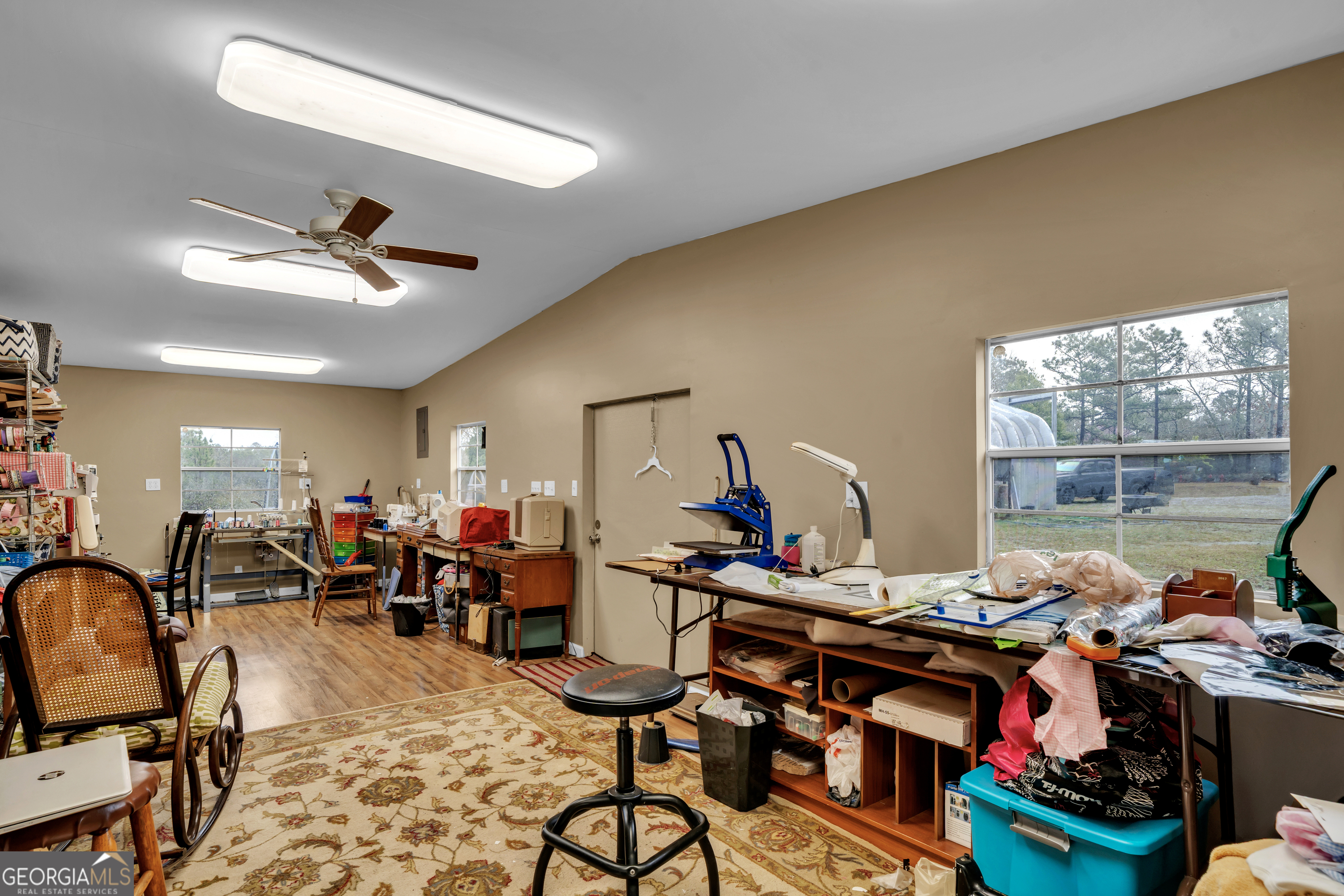 271 Dr Brooks Road Box Springs, GA 31801 - Photo 57 of 63 a living room filled with lots of furniture and a chandelier