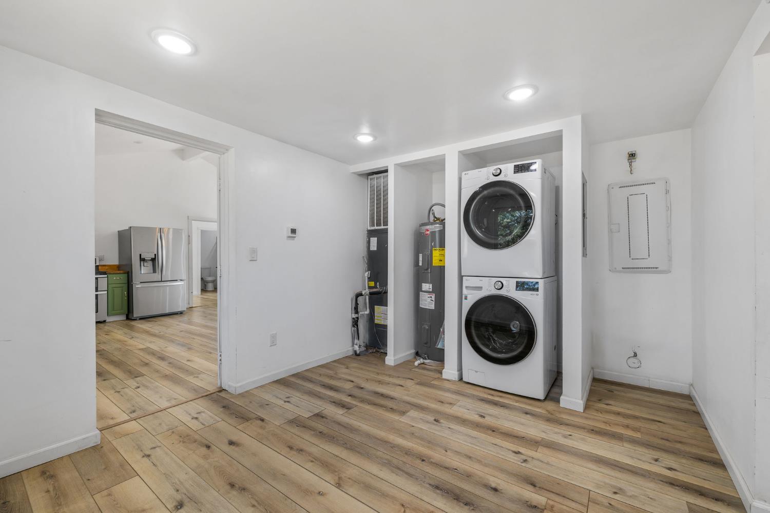 7145 Superior Town Road Lincoln, CA 95648 - Photo 11 of 94 a view of a hallway with washer and dryer