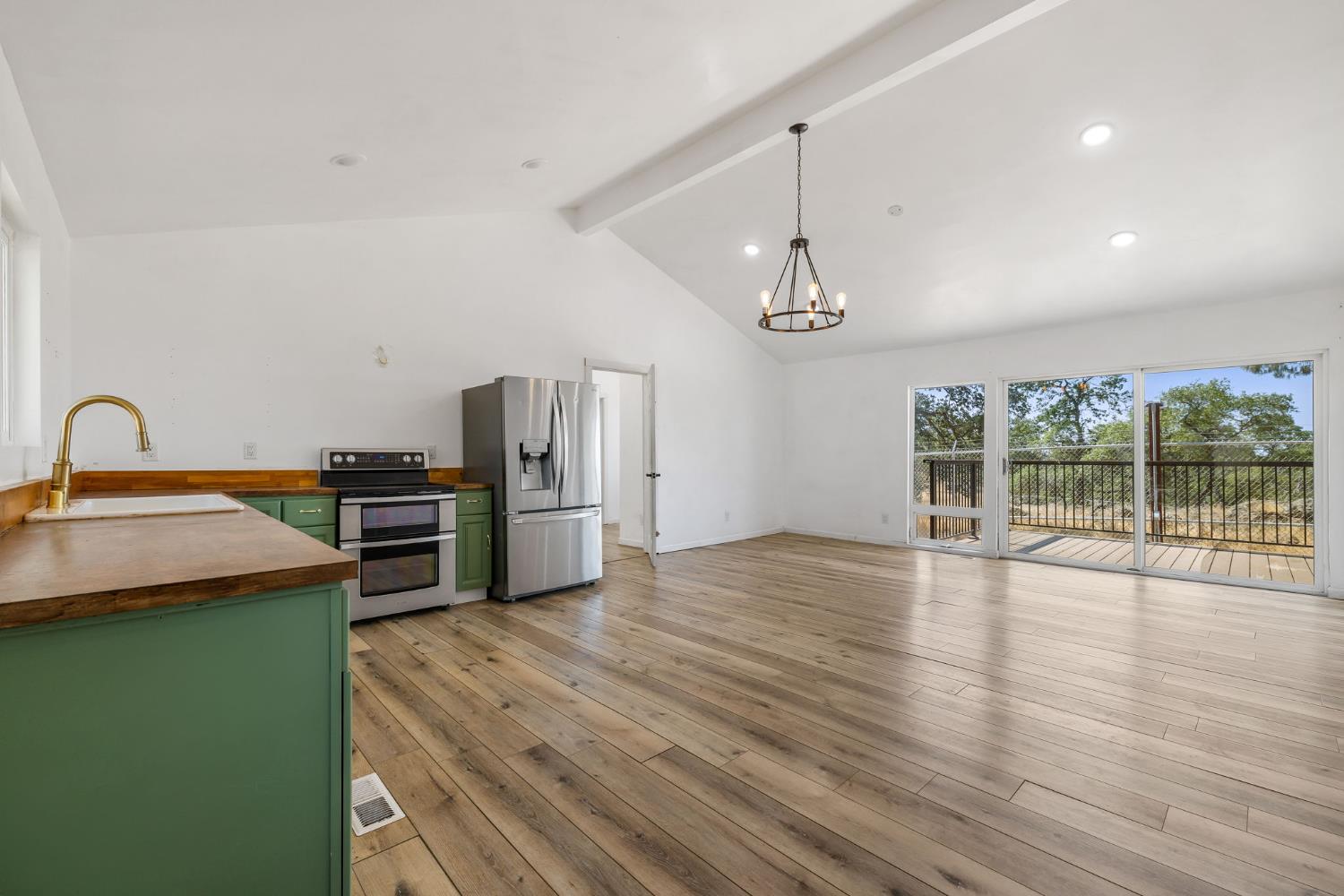 7145 Superior Town Road Lincoln, CA 95648 - Photo 14 of 94 a open kitchen with stainless steel appliances granite countertop a sink a stove and a refrigerator