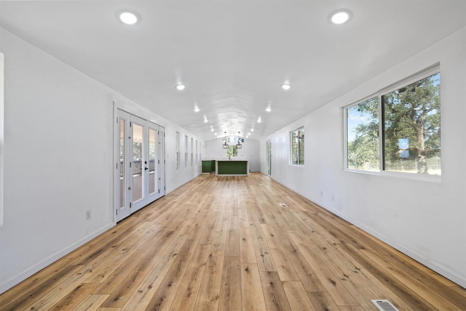 7145 Superior Town Road Lincoln, CA 95648 - Photo 29 of 94 wooden floor in an empty room with a window