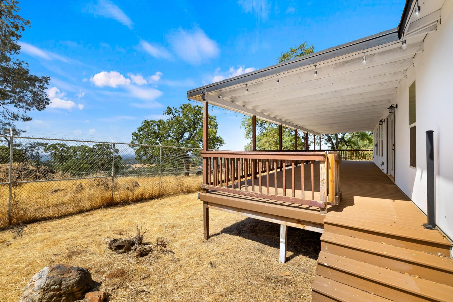 7145 Superior Town Road Lincoln, CA 95648 - Photo 41 of 94 a view of backyard with deck and outdoor seating