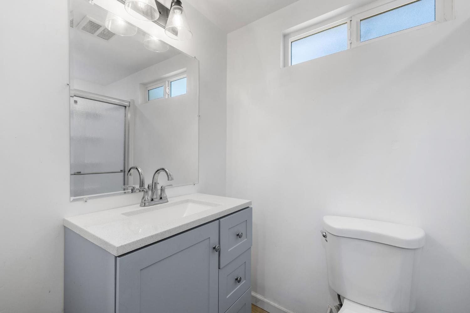 7145 Superior Town Road Lincoln, CA 95648 - Photo 8 of 94 a bathroom with a sink vanity and a toilet