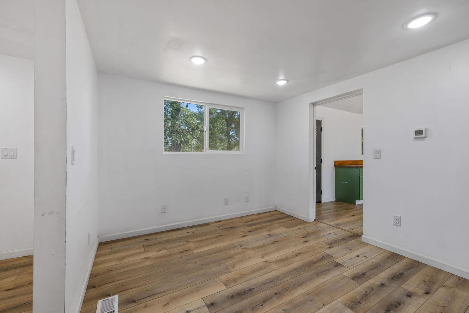 7145 Superior Town Road Lincoln, CA 95648 - Photo 10 of 94 an empty room with windows