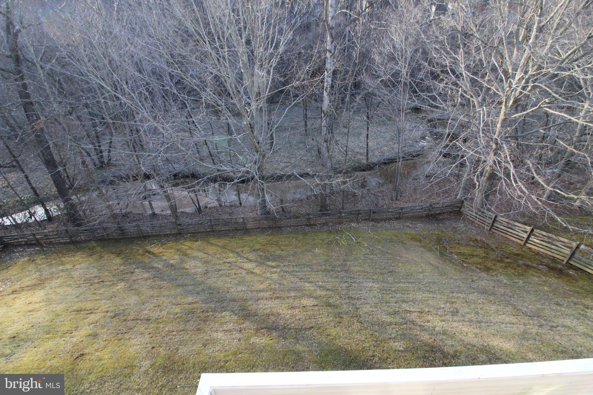 12990 Pintail Road Woodbridge, VA 22192 - Photo 29 of 37 Creek Runs Along Back of Property