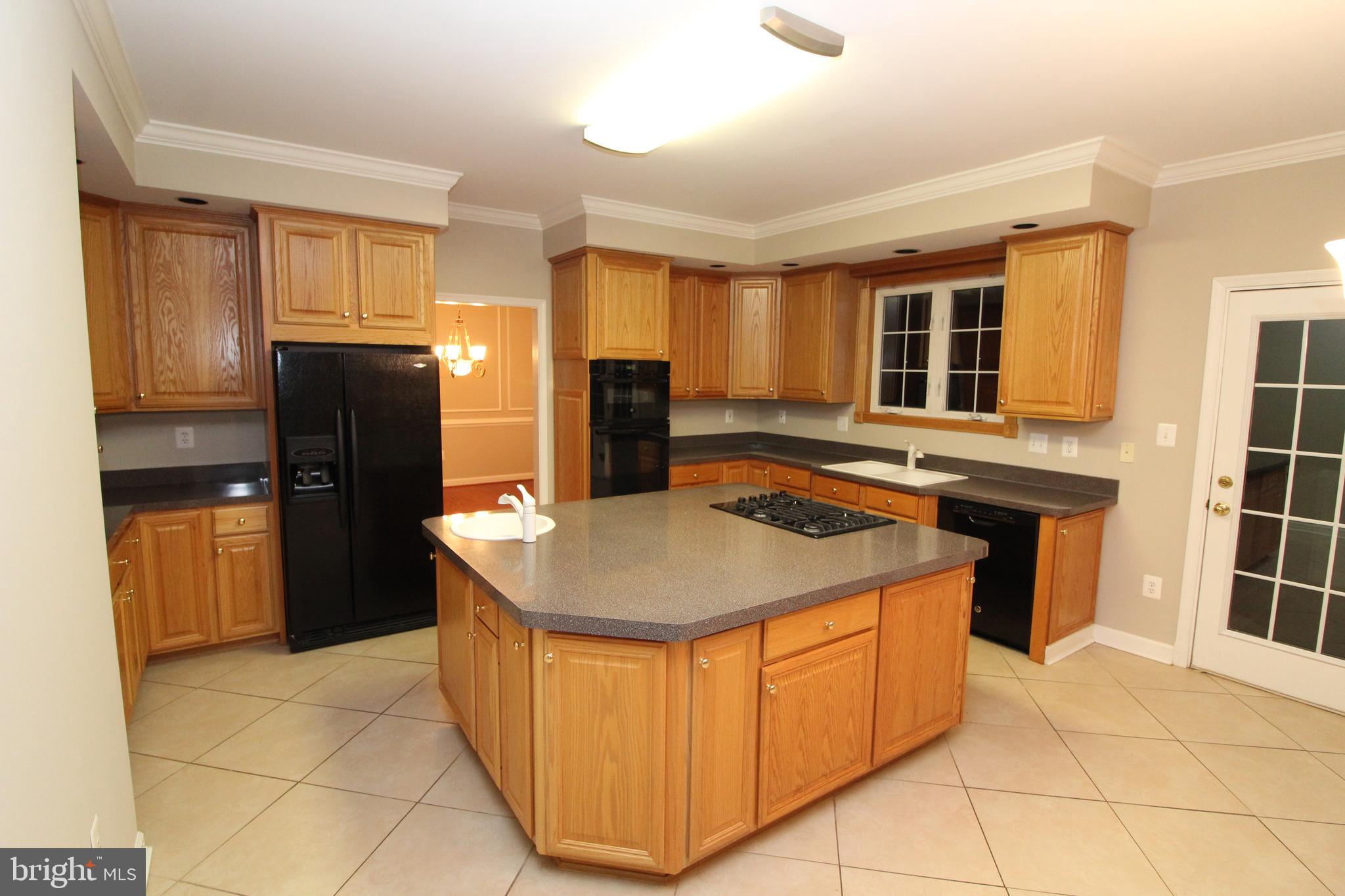 12990 Pintail Road Woodbridge, VA 22192 - Photo 8 of 37 Spacious Kitchen With Island