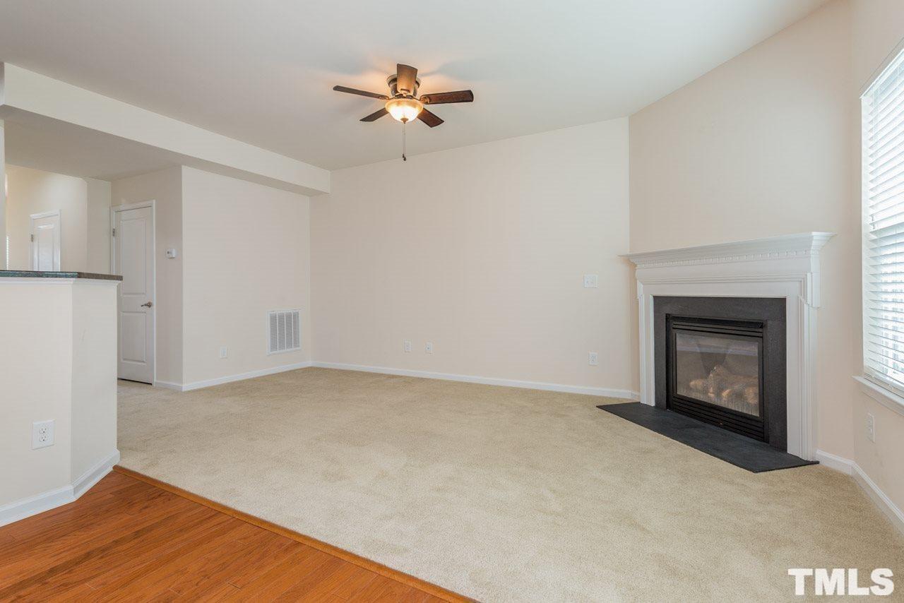 473 Panorama View Loop Cary, NC 27519 - Photo 7 of 17 a view of an empty room with a fireplace